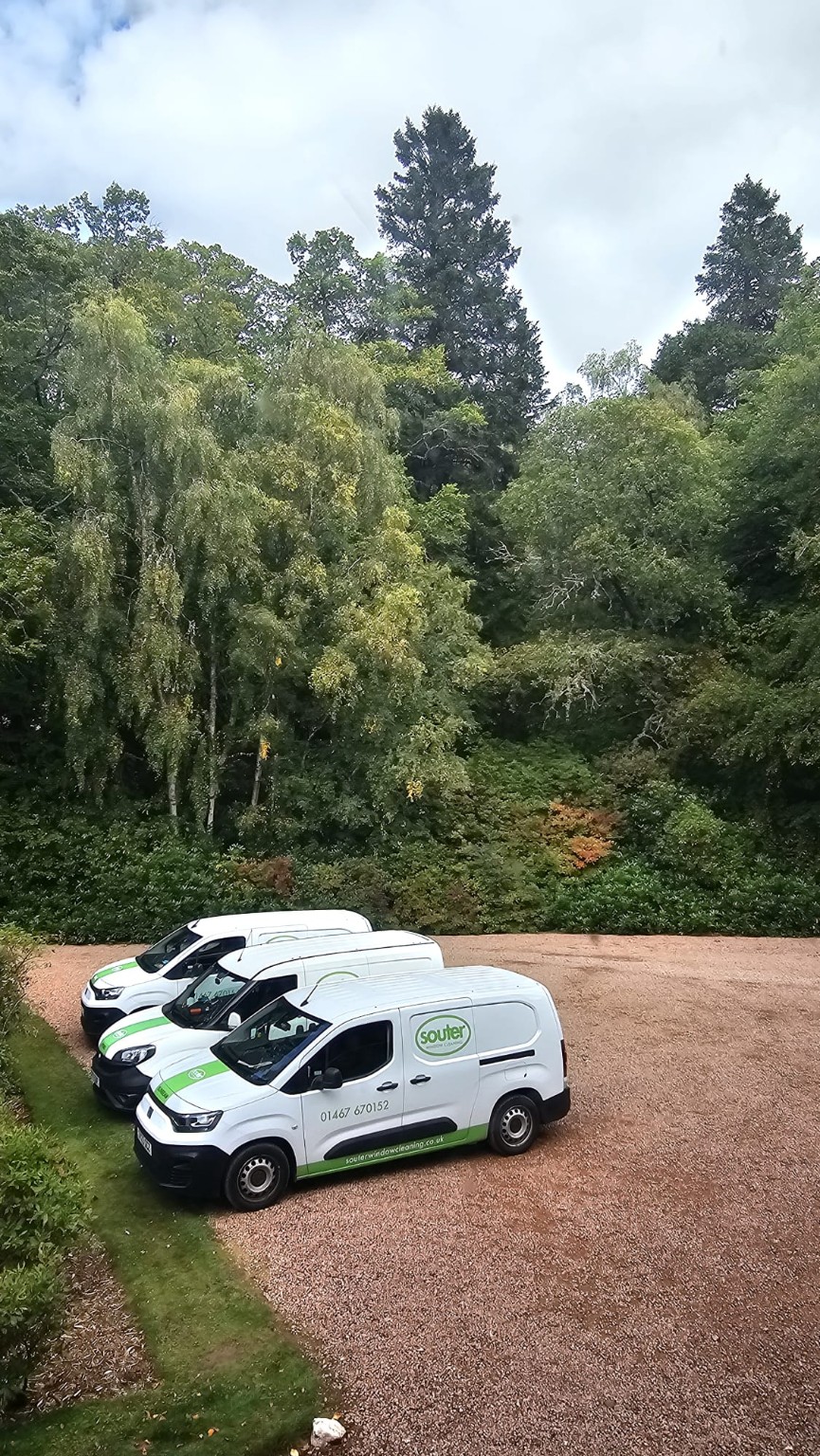 The Souter Window Cleaning fleet lined up in the yard